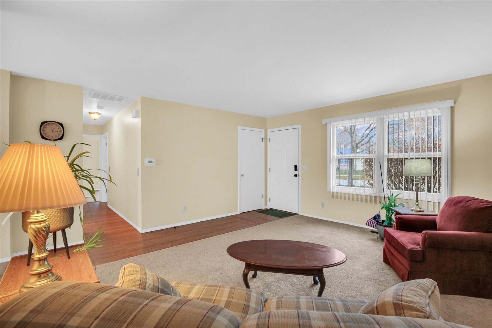 2302 Blackthorn Drive Champaign, IL 61821 - Photo 11 of 31 a living room with furniture and a window