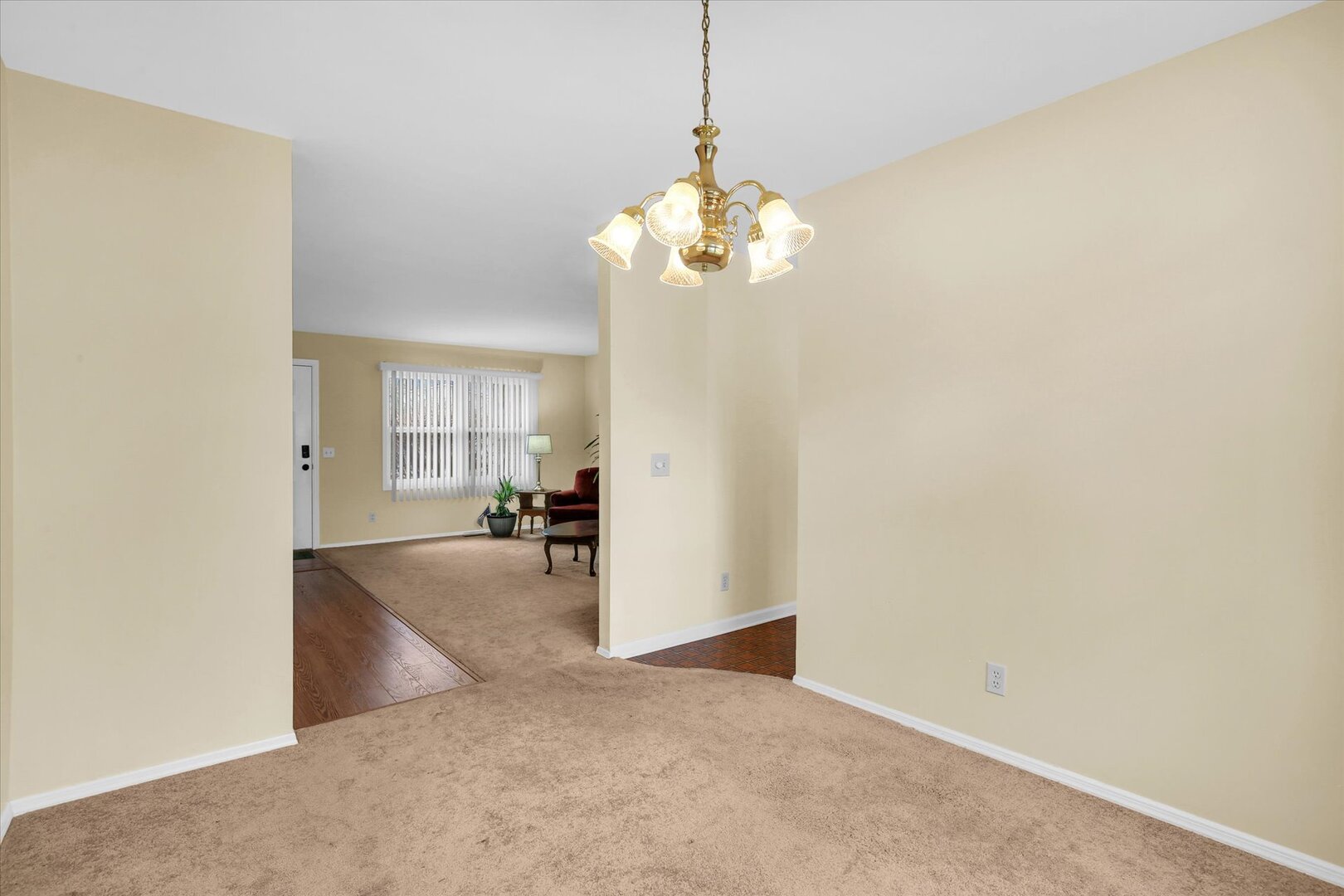 2302 Blackthorn Drive Champaign, IL 61821 - Photo 12 of 31 a view of livingroom with chandelier