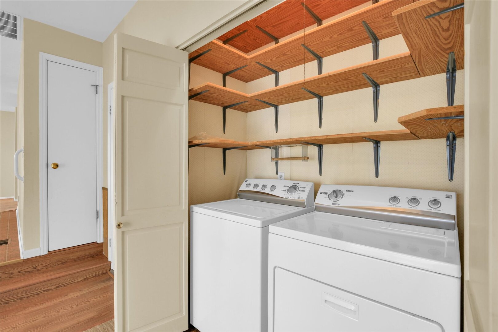 2302 Blackthorn Drive Champaign, IL 61821 - Photo 17 of 31 a view of storage and utility room with washer and dryer