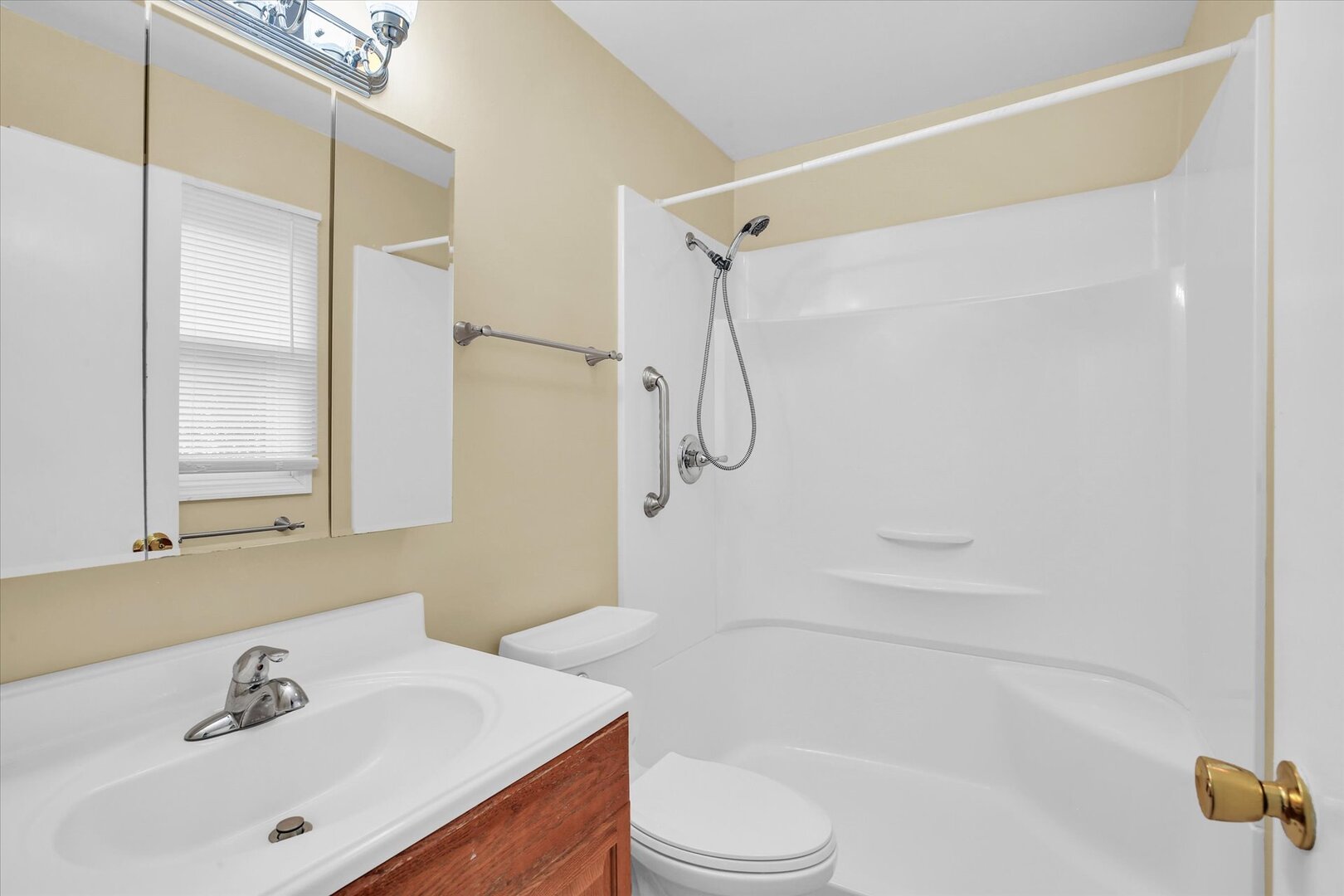 2302 Blackthorn Drive Champaign, IL 61821 - Photo 23 of 31 a bathroom with a sink toilet and shower