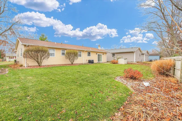 a view of house with garden