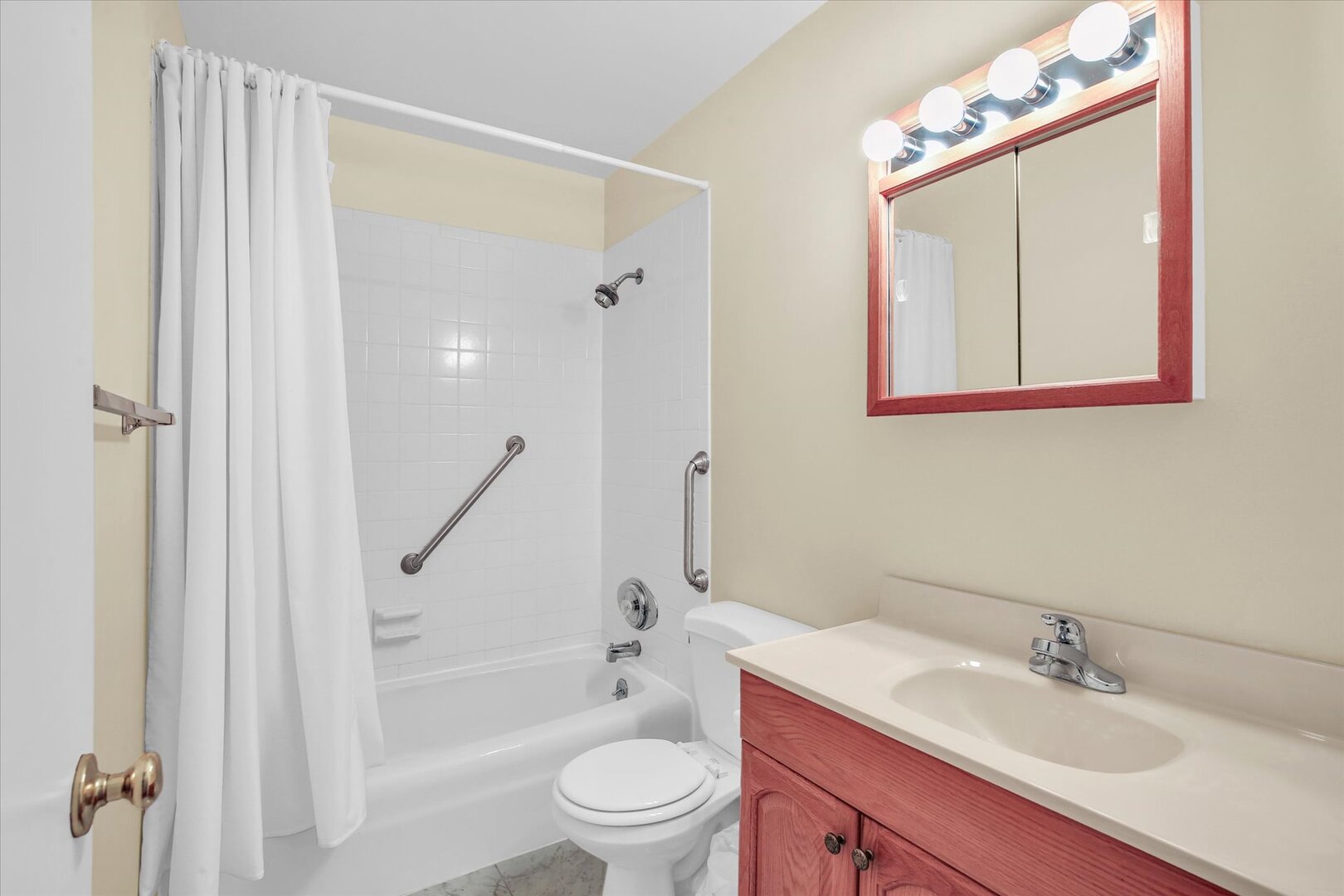 2302 Blackthorn Drive Champaign, IL 61821 - Photo 6 of 31 a bathroom with a sink a toilet and shower