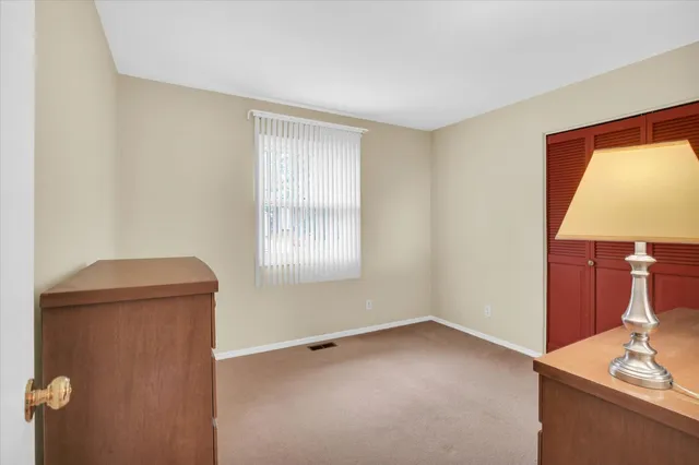 a view of livingroom with furniture and window
