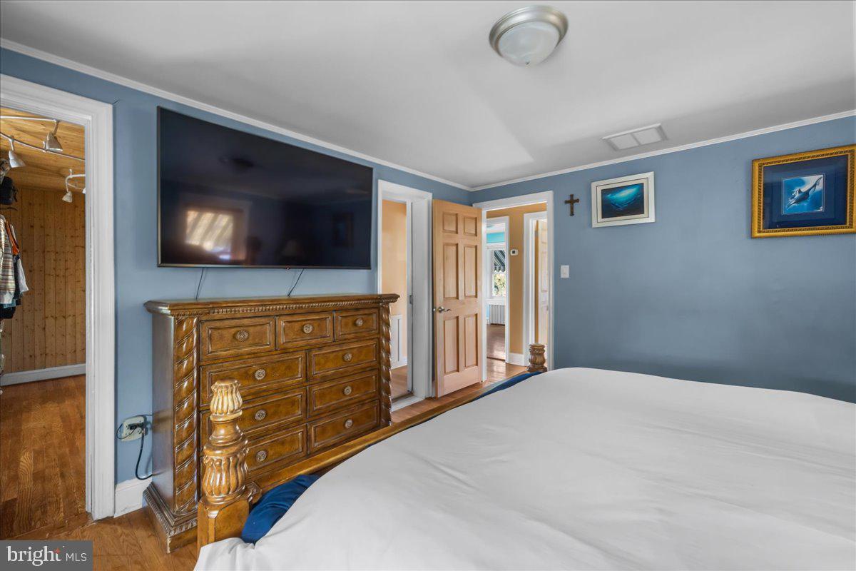 227 Miller Street Winchester, VA 22601 - Photo 22 of 51 a bedroom with a bed and a flat screen tv