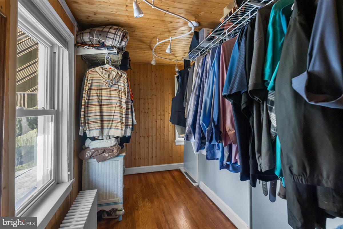 227 Miller Street Winchester, VA 22601 - Photo 24 of 51 a view of walk in closet with clothes and shoes