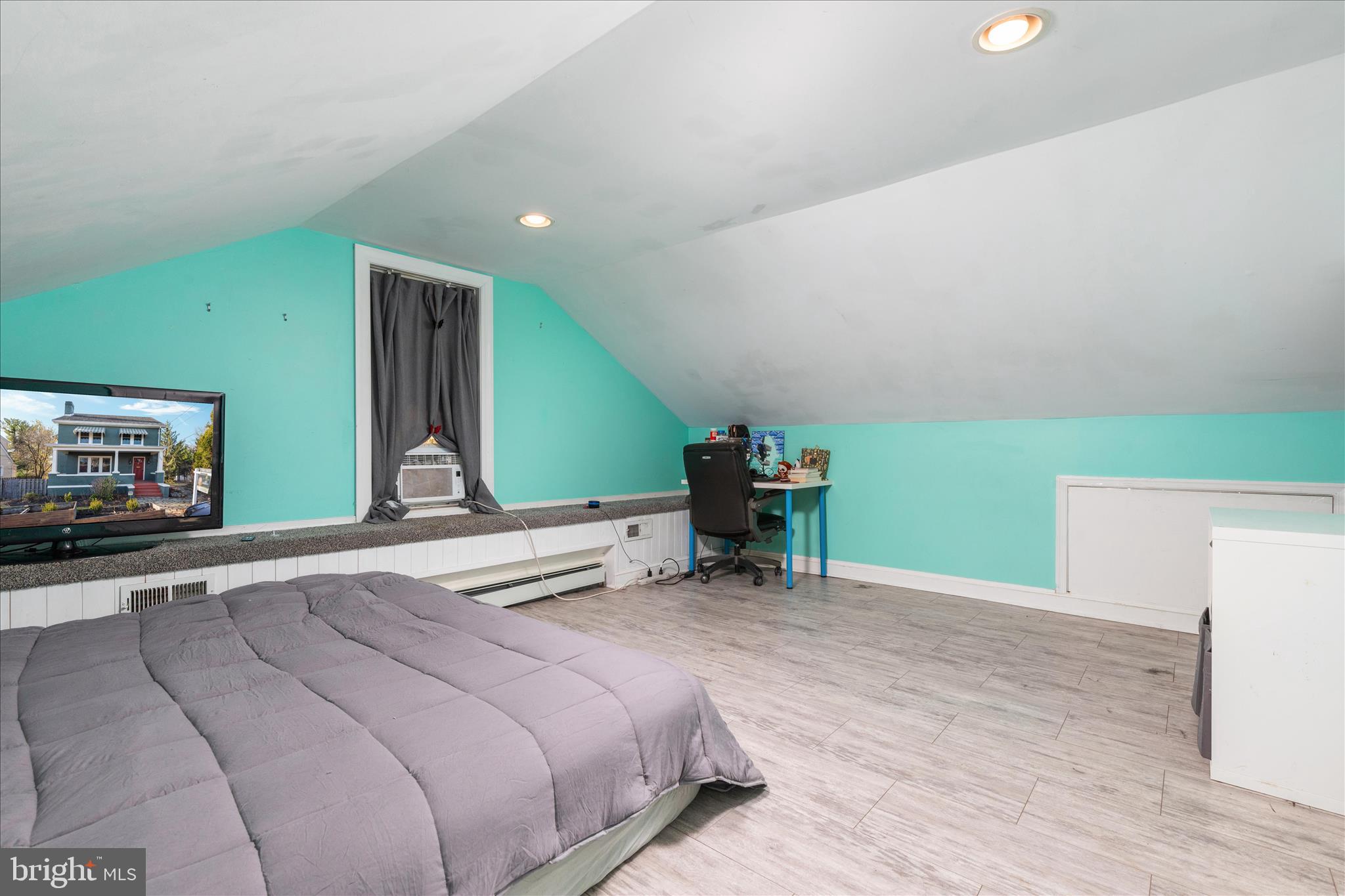 227 Miller Street Winchester, VA 22601 - Photo 29 of 51 a bed room with a bed and a television