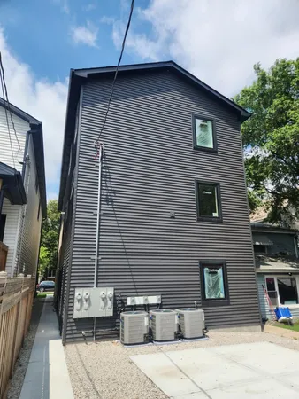 a front view of a house with garage