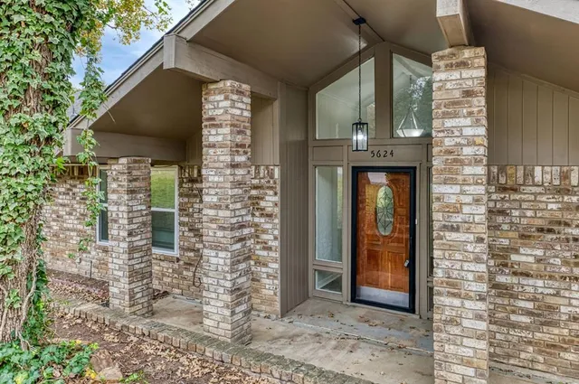 a front view of a house with a shower
