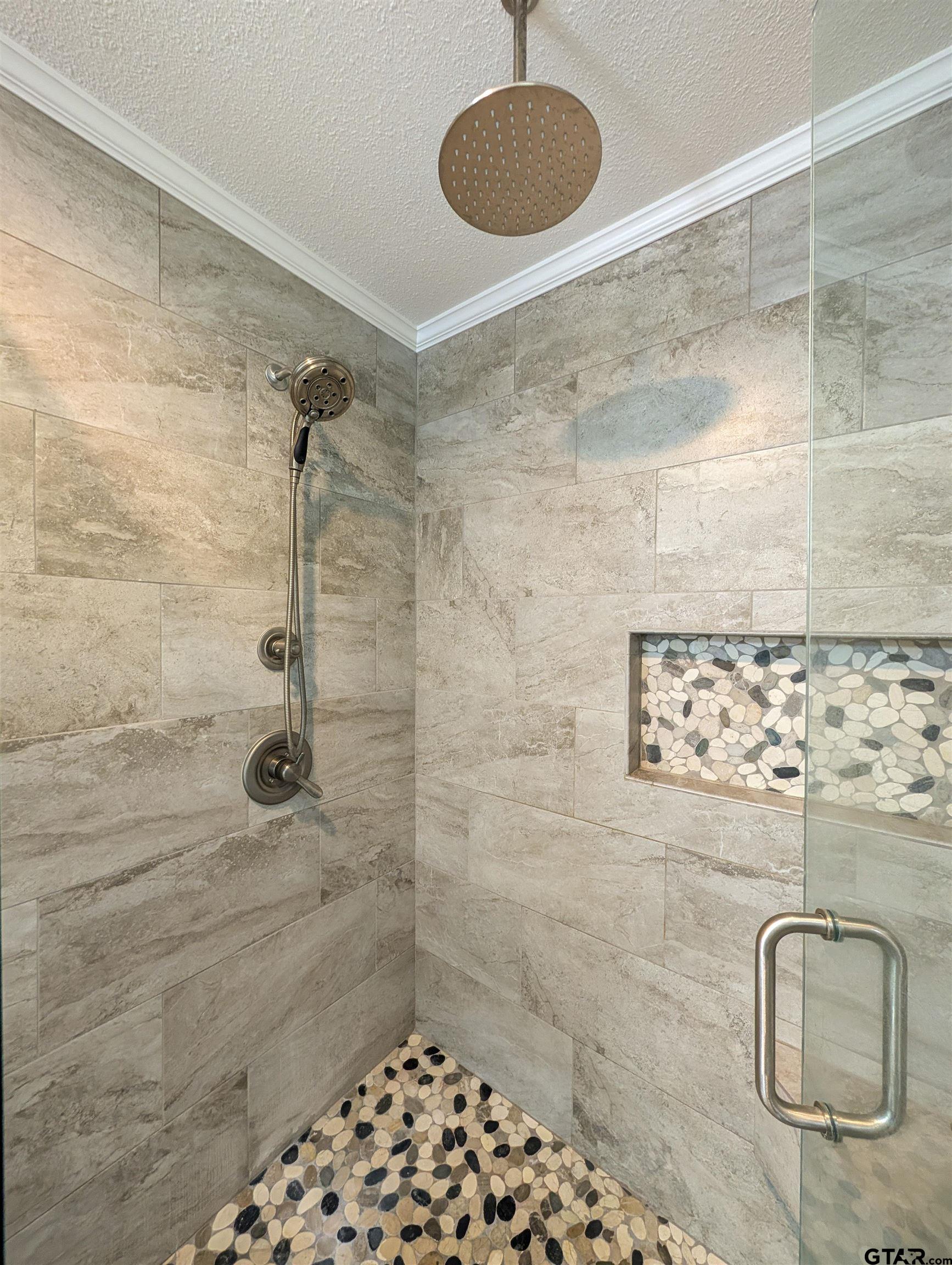 5921 Springbrook Drive Tyler, TX 75707 - Photo 32 of 39 a bathroom with a shower