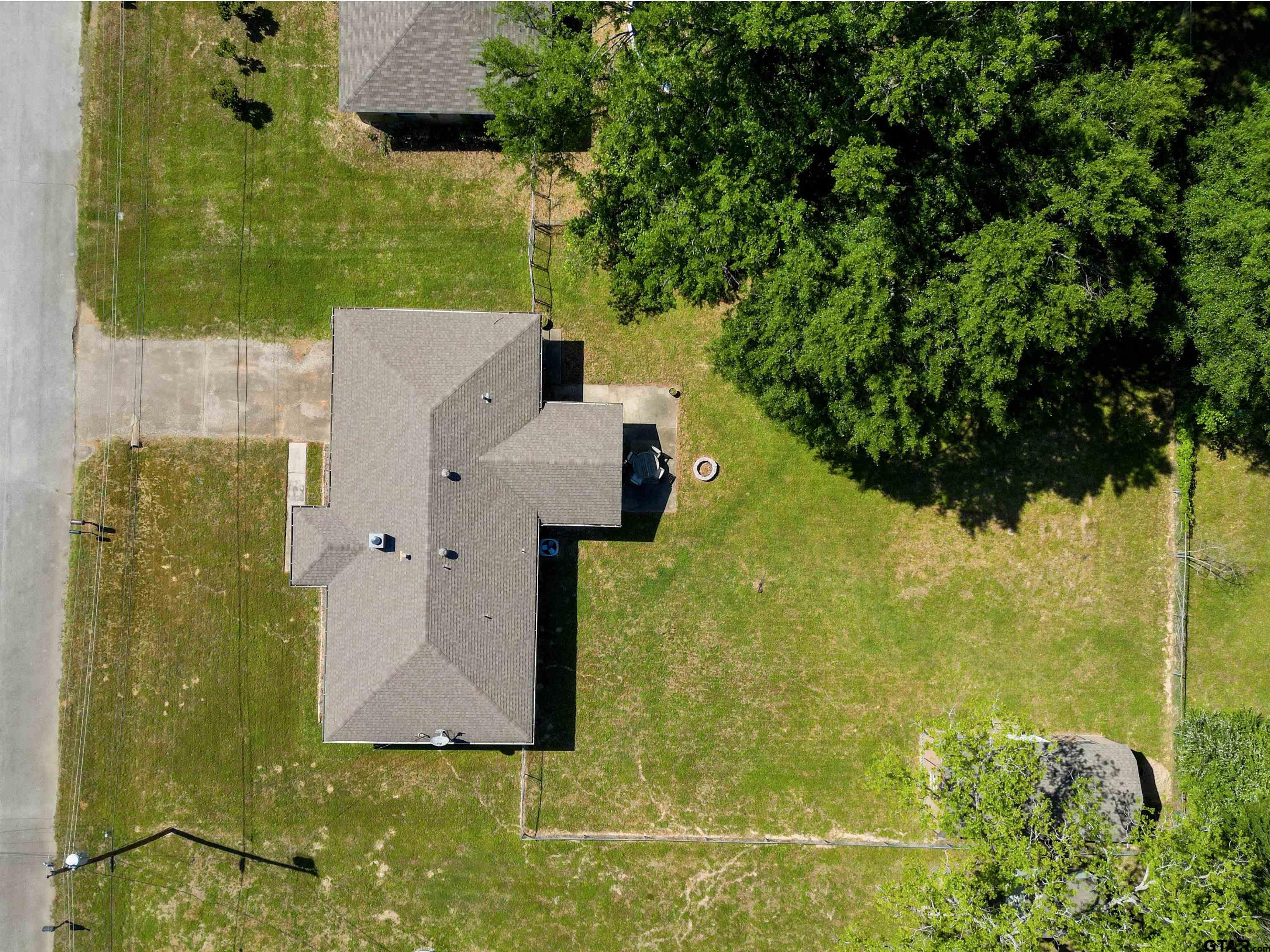 5921 Springbrook Drive Tyler, TX 75707 - Photo 37 of 39 an aerial view of a house with a yard