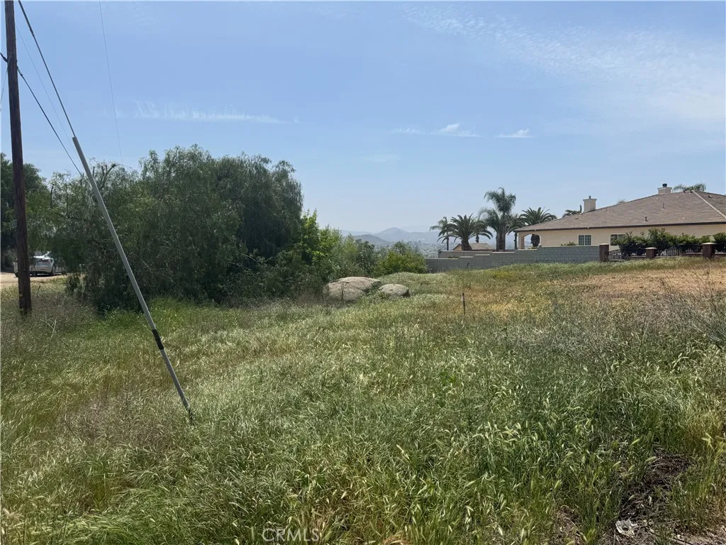 a view of a town with mountains in the background