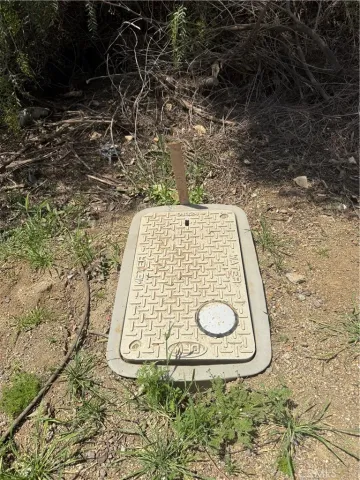 a sign that is sitting on a wooden floor
