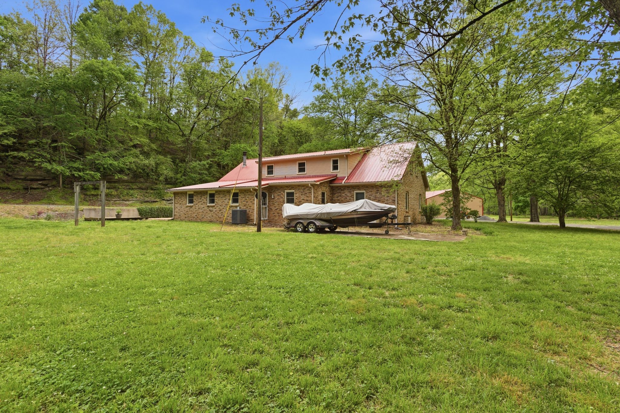 580 Defeated Creek Road Centerville, TN 37033 - Photo 58 of 71 a house view with a garden space
