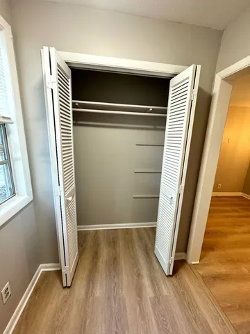 a view of wooden floor in an empty room