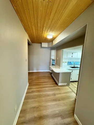 a view of a kitchen with a sink