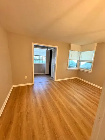 a view of an empty room and window