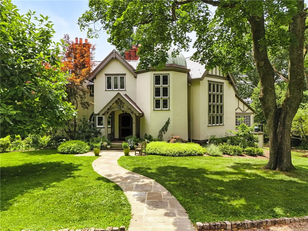 743 Chestnut Road Sewickley, PA 15143 - Photo 1 of 40 a front view of a house with a yard