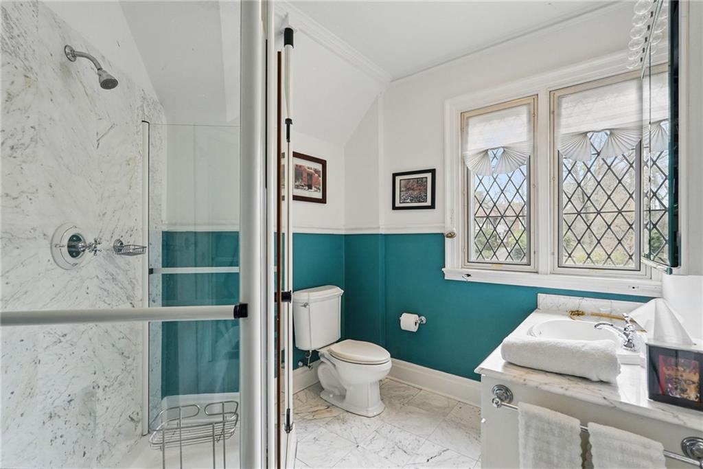 743 Chestnut Road Sewickley, PA 15143 - Photo 19 of 40 a bathroom with a toilet sink and mirror