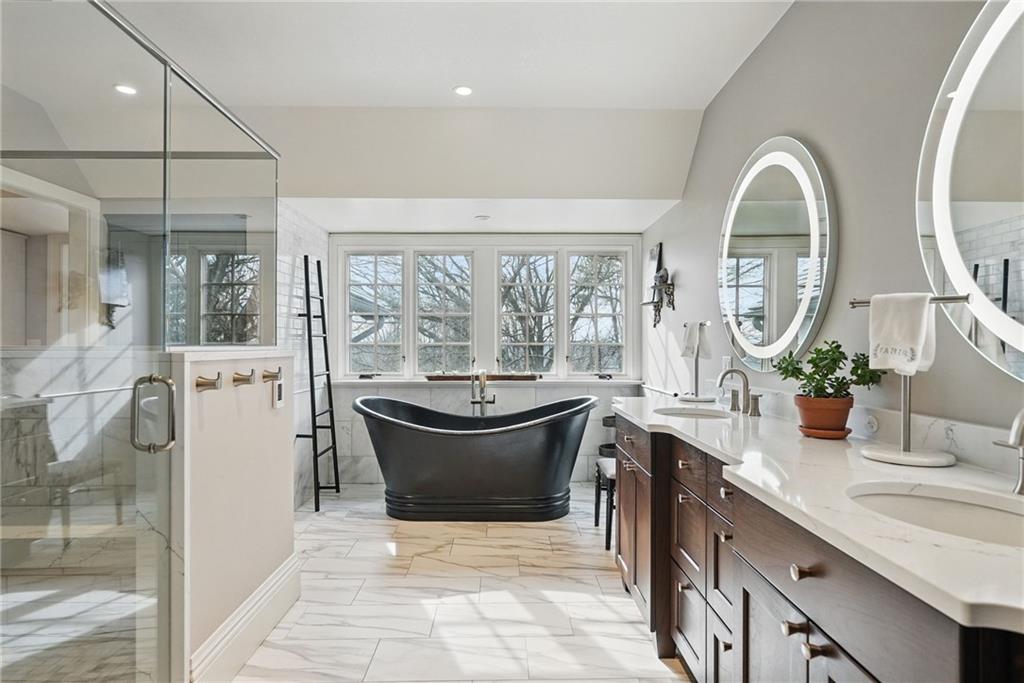 743 Chestnut Road Sewickley, PA 15143 - Photo 22 of 40 a large white kitchen with a large window