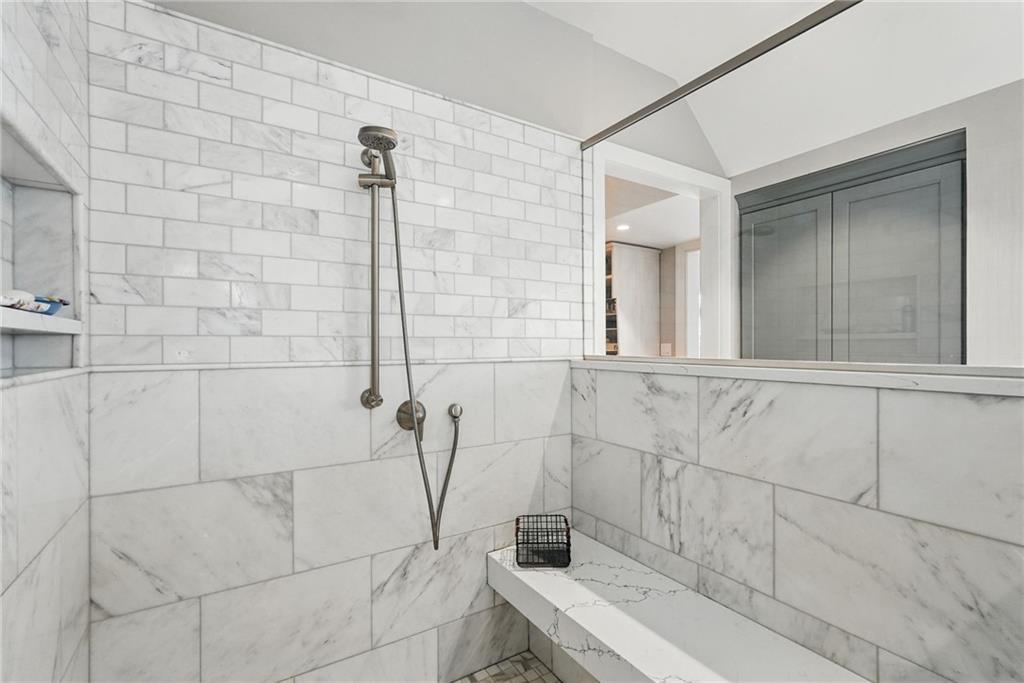 743 Chestnut Road Sewickley, PA 15143 - Photo 24 of 40 a bathroom with a bathtub and shower