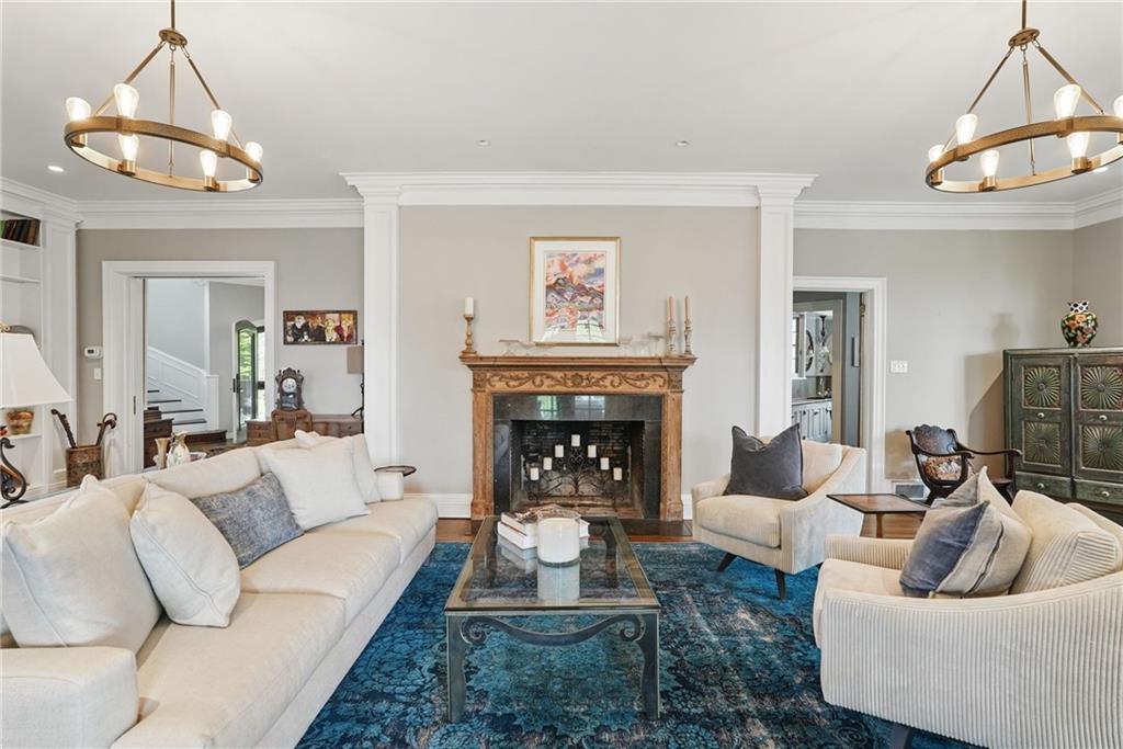 743 Chestnut Road Sewickley, PA 15143 - Photo 8 of 40 a living room with furniture and a fireplace