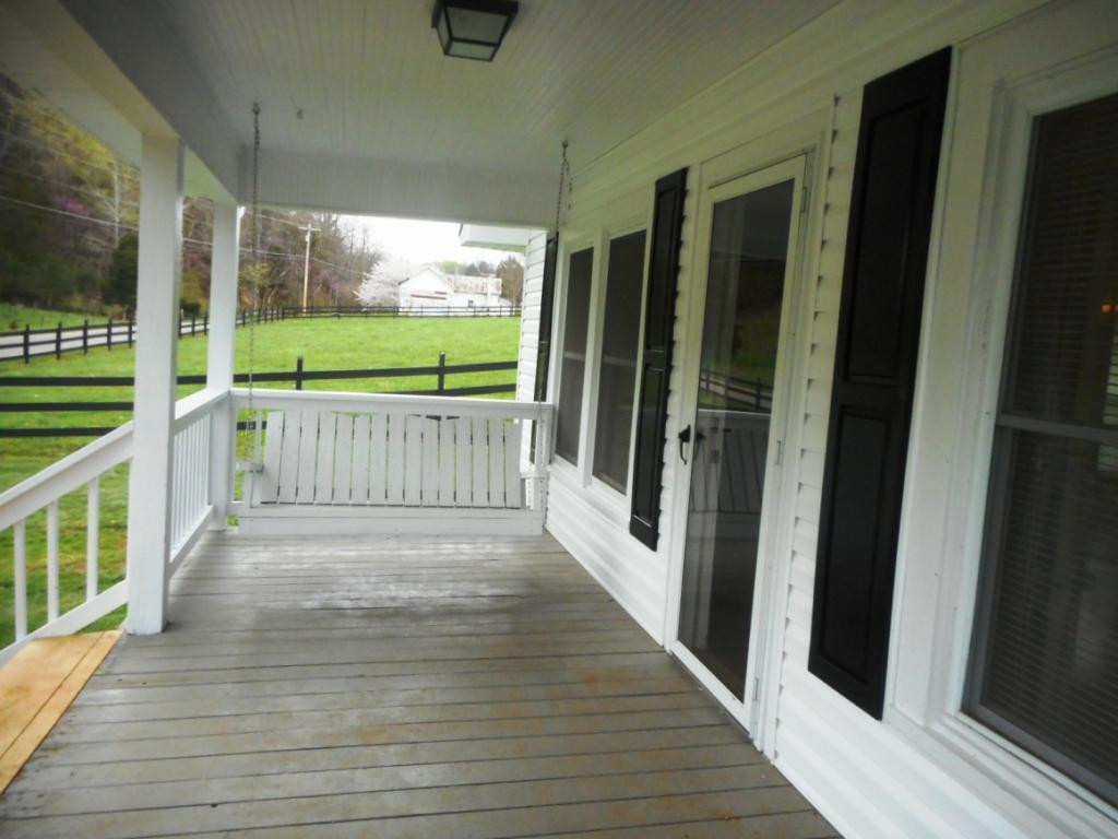 830 Blue Springs Road Elizabethton, TN 37643 - Photo 4 of 12 Front porch swing