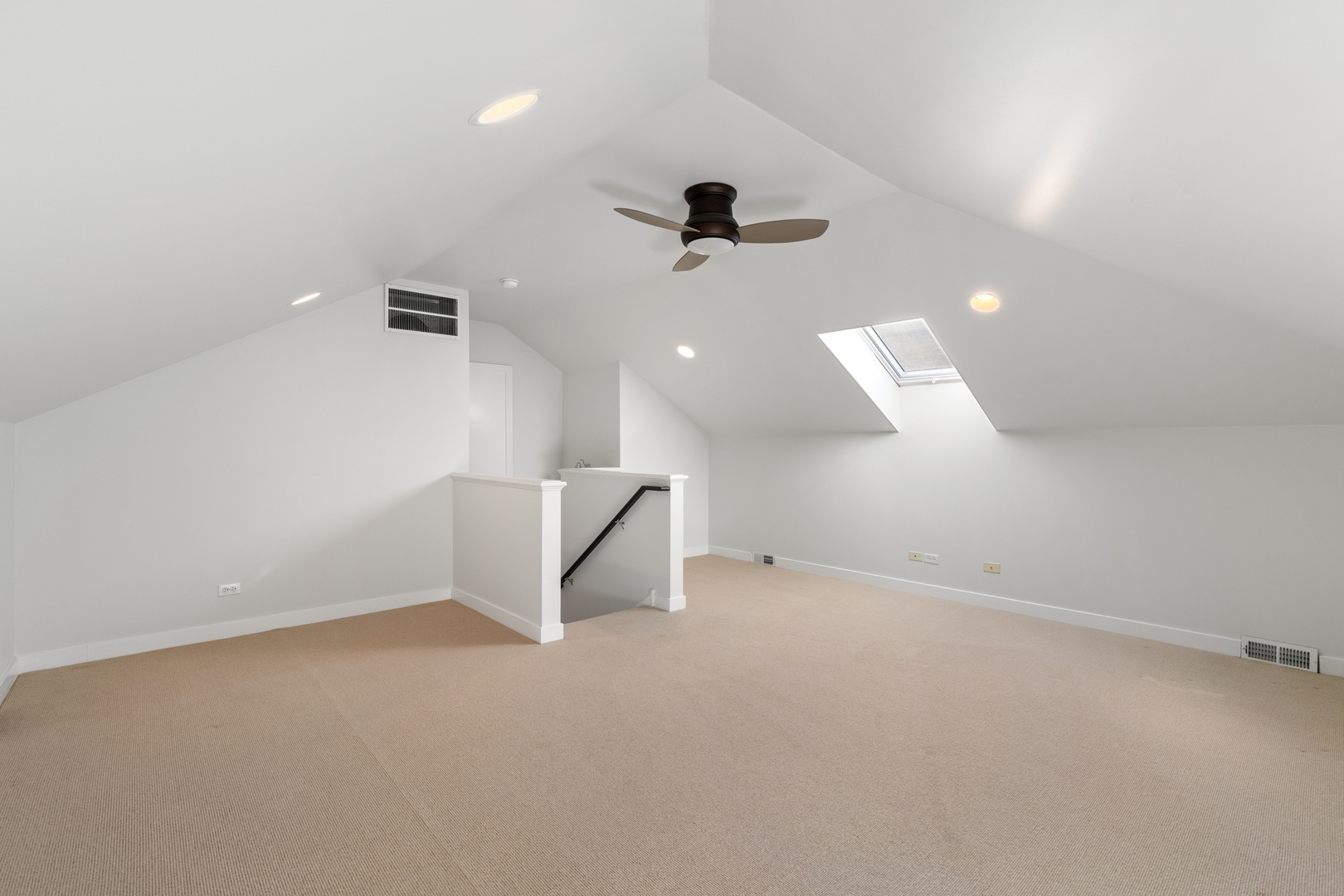 105 Ronan Road Highwood, IL 60040 - Photo 12 of 21 an empty room with a projector and windows