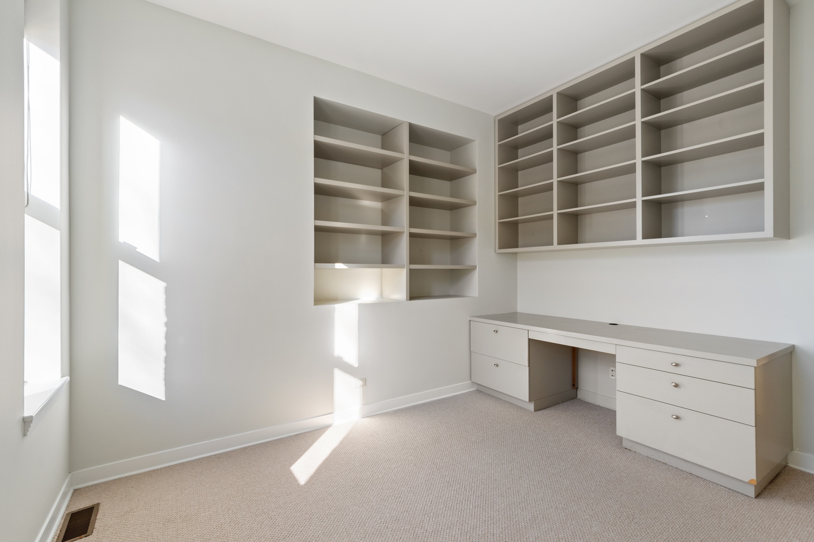 105 Ronan Road Highwood, IL 60040 - Photo 16 of 21 a view of an empty room with a window