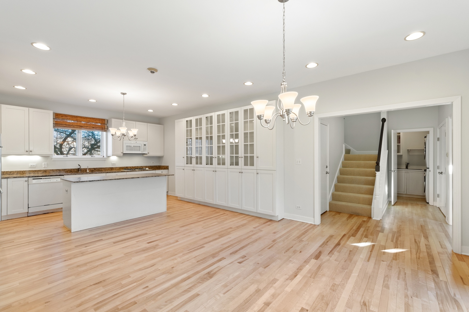 105 Ronan Road Highwood, IL 60040 - Photo 9 of 21 a view of kitchen with cabinets and wooden floor