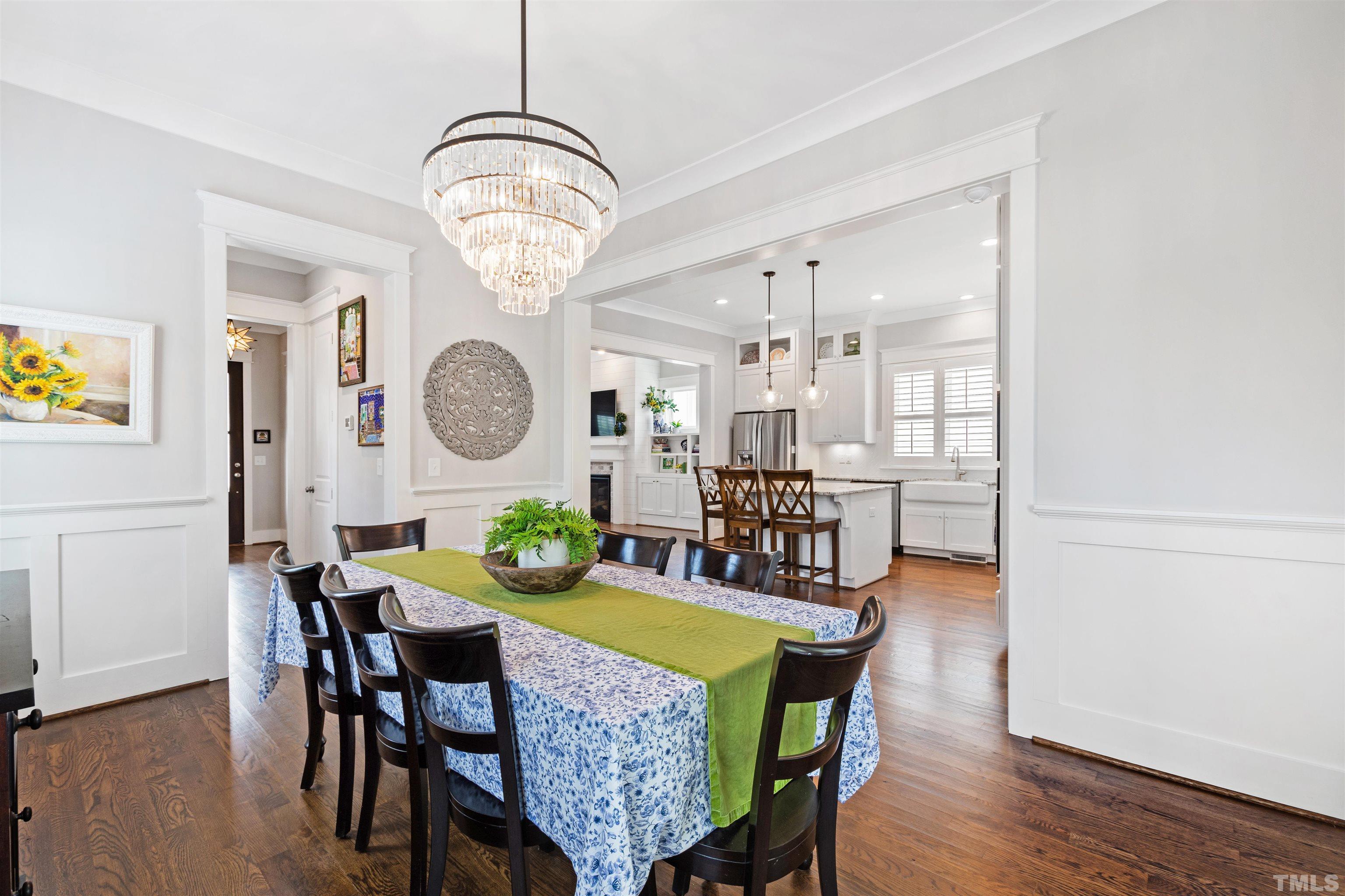 721 Virginia Avenue Raleigh, NC 27604 - Photo 19 of 49 a view of a dining room with furniture and wooden floor