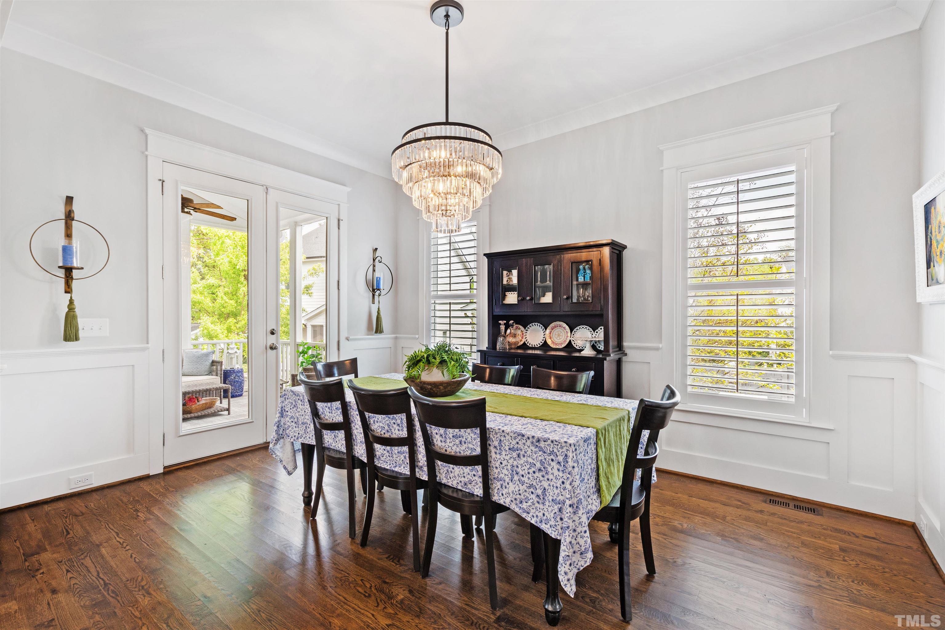 721 Virginia Avenue Raleigh, NC 27604 - Photo 20 of 49 a view of a dining room with furniture window and wooden floor