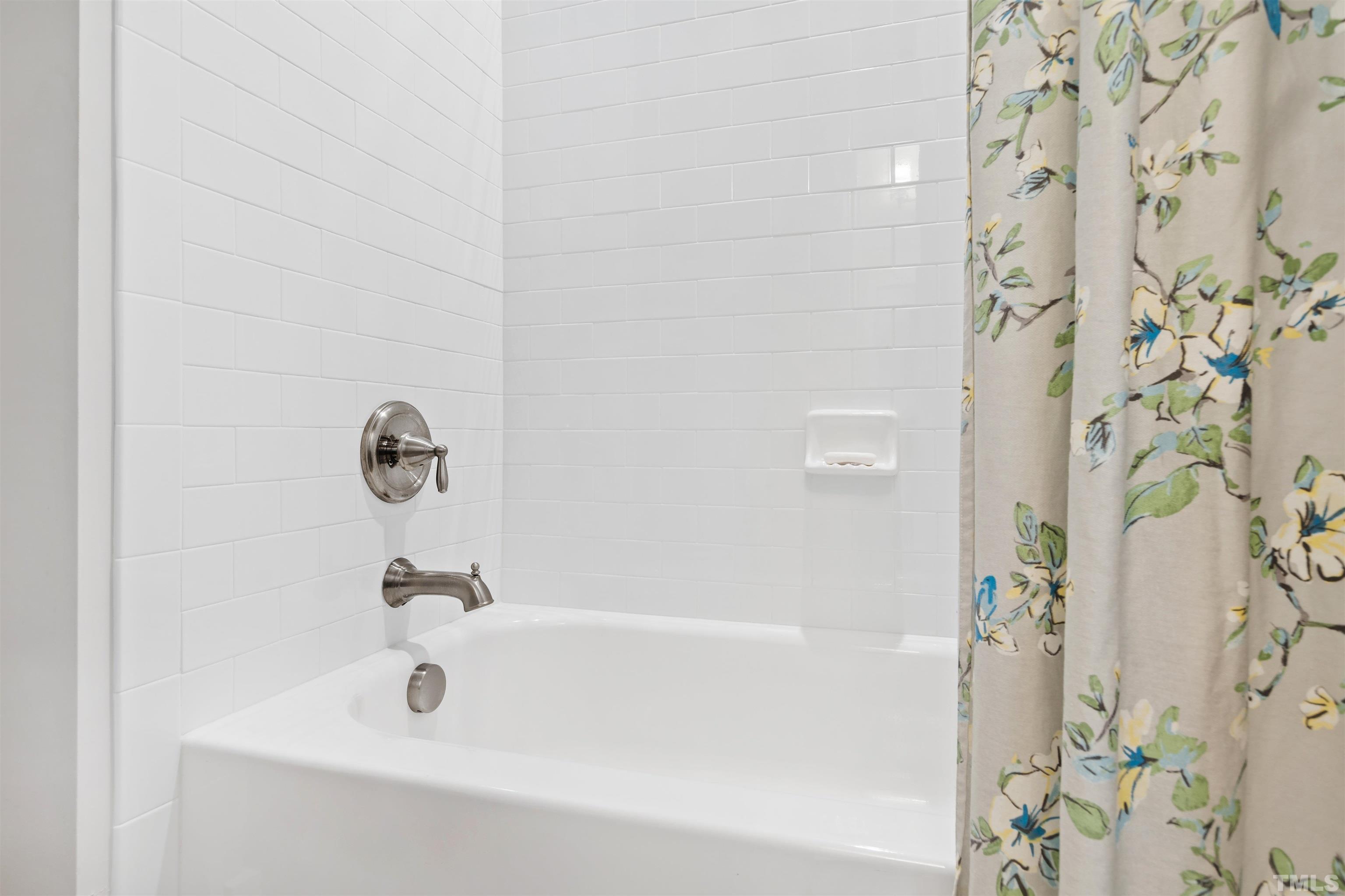 721 Virginia Avenue Raleigh, NC 27604 - Photo 35 of 49 a bathroom with a shower