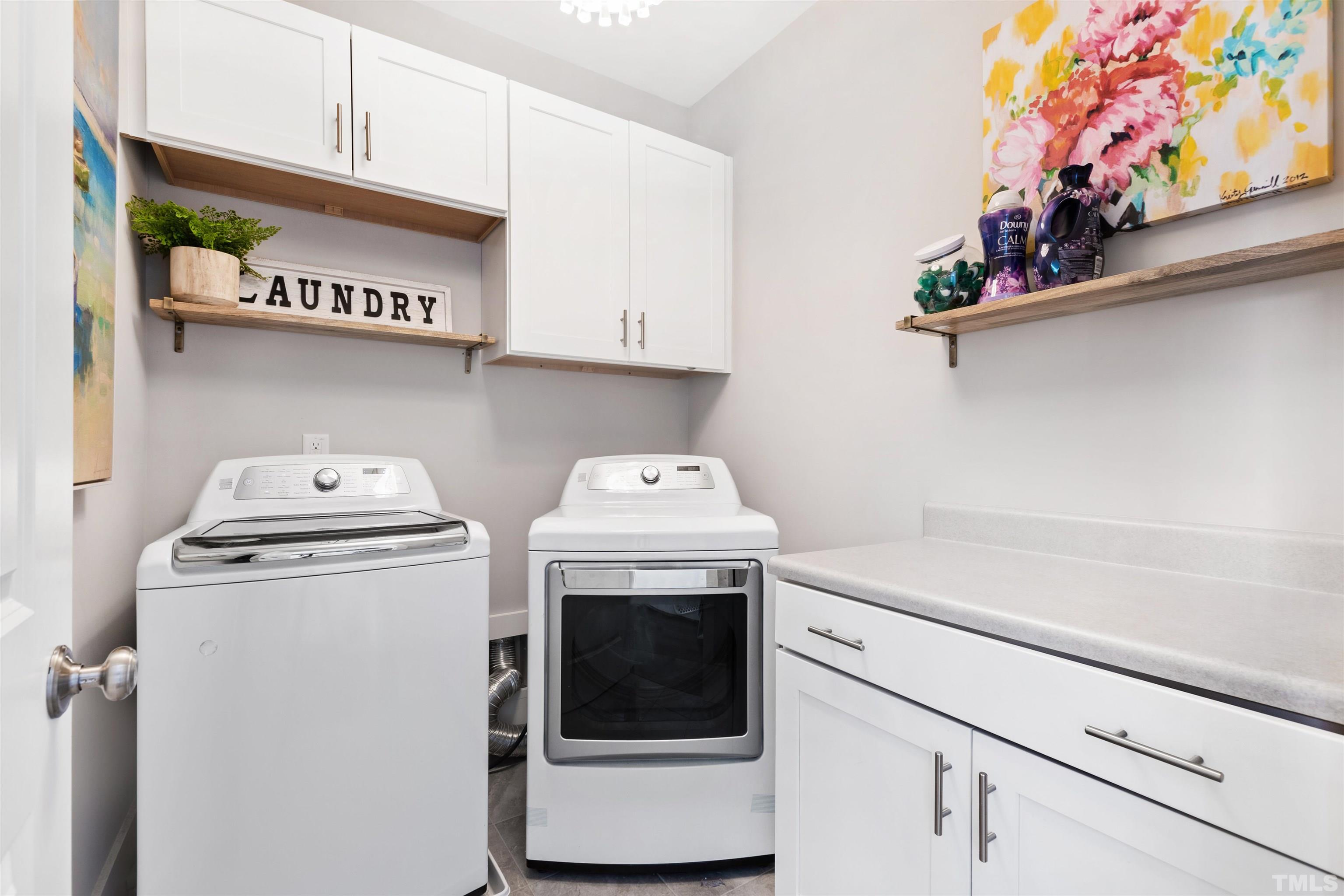 721 Virginia Avenue Raleigh, NC 27604 - Photo 36 of 49 a utility room with dryer and washer