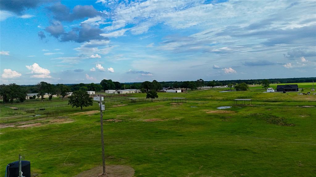 1160 Doss Road Millsap, TX 76066 - Photo 17 of 24 a view of a golf course with a garden