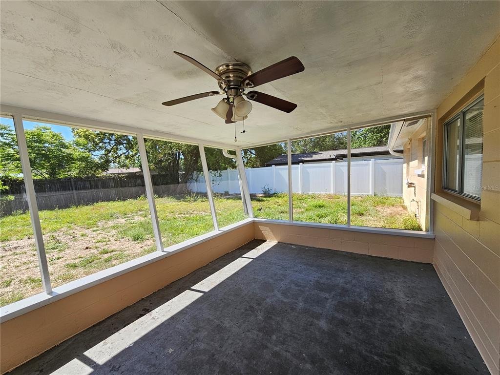 9210 Pegasus Avenue Port Richey, FL 34668 - Photo 15 of 19 a view of an empty room and window