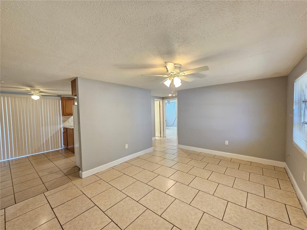 9210 Pegasus Avenue Port Richey, FL 34668 - Photo 4 of 19 a view of an empty room and window