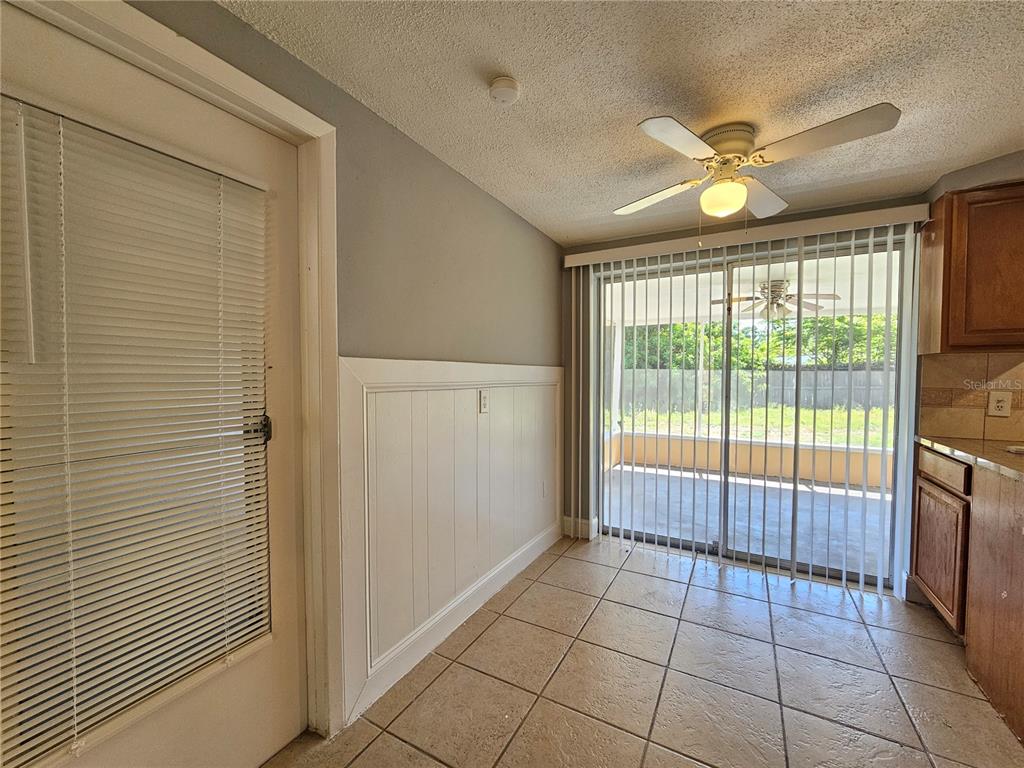 9210 Pegasus Avenue Port Richey, FL 34668 - Photo 8 of 19 a view of an empty room with a window