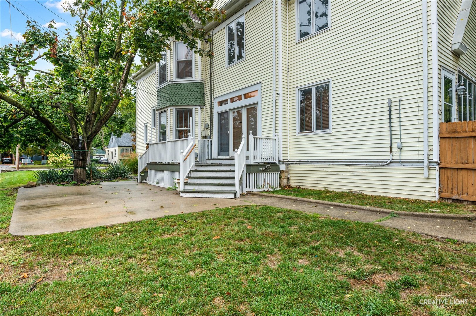 230 Comstock Street Joliet, IL 60436 - Photo 17 of 21 a view of a house with a backyard