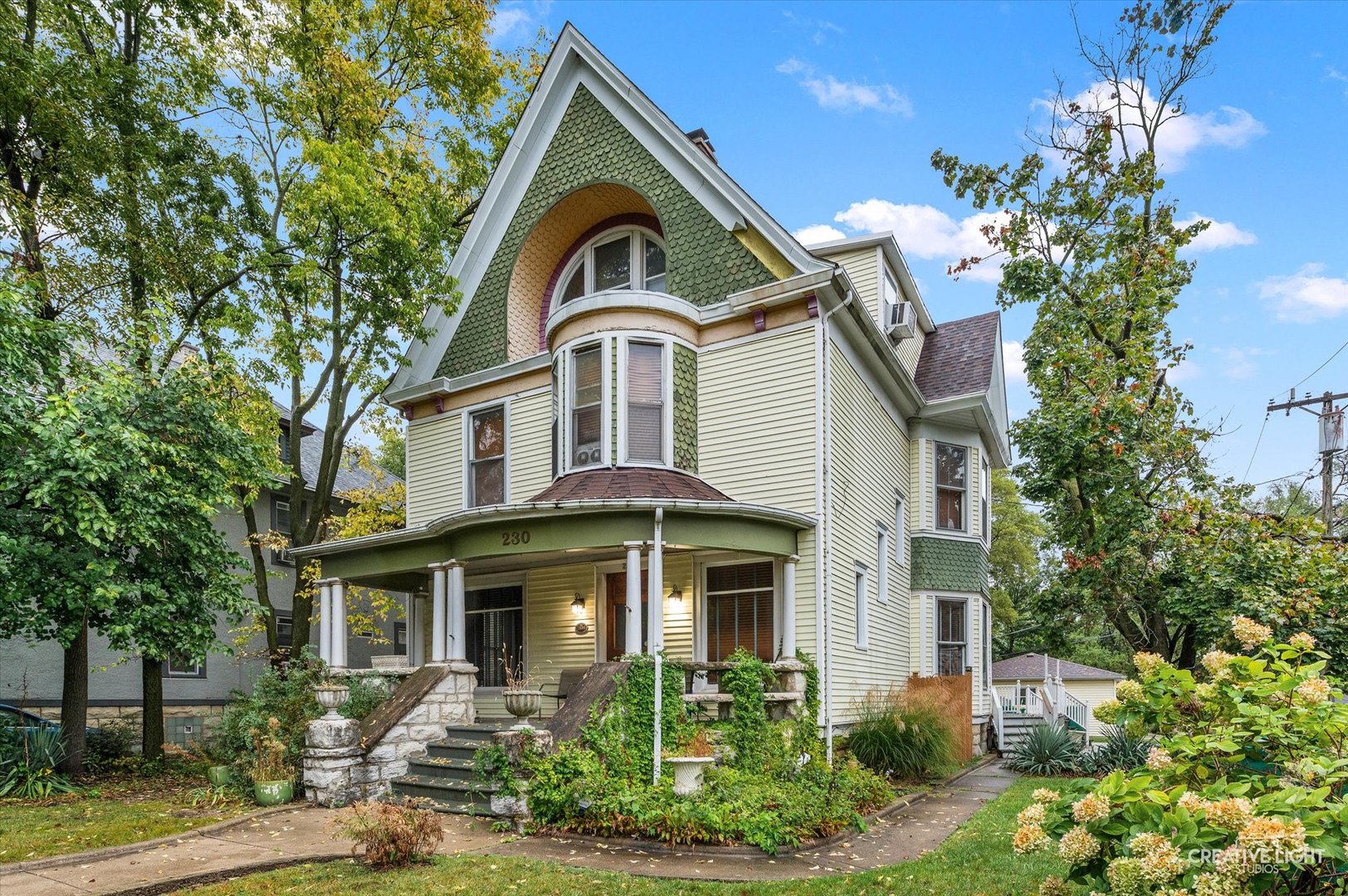 230 Comstock Street Joliet, IL 60436 - Photo 21 of 21 a front view of a house with a yard