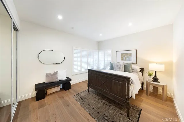 a en suite bathroom with a granite countertop sink toilet and shower