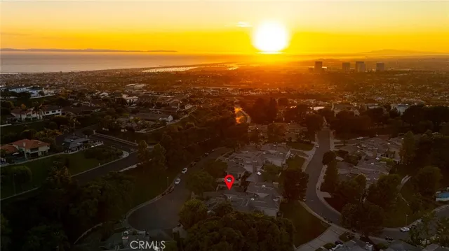 a view of a building with potted plants