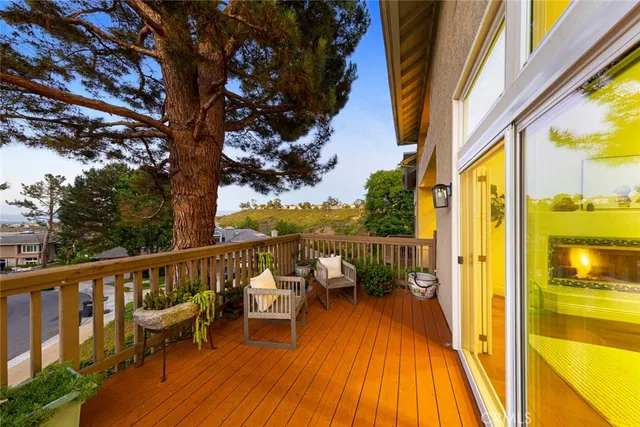 a backyard of a house with flower plants
