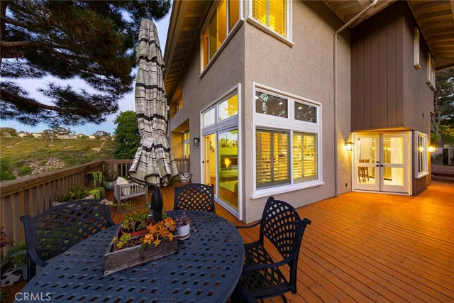 an aerial view of residential house with outdoor space and swimming pool