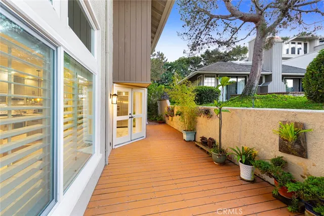 an aerial view of residential houses with outdoor space and street view