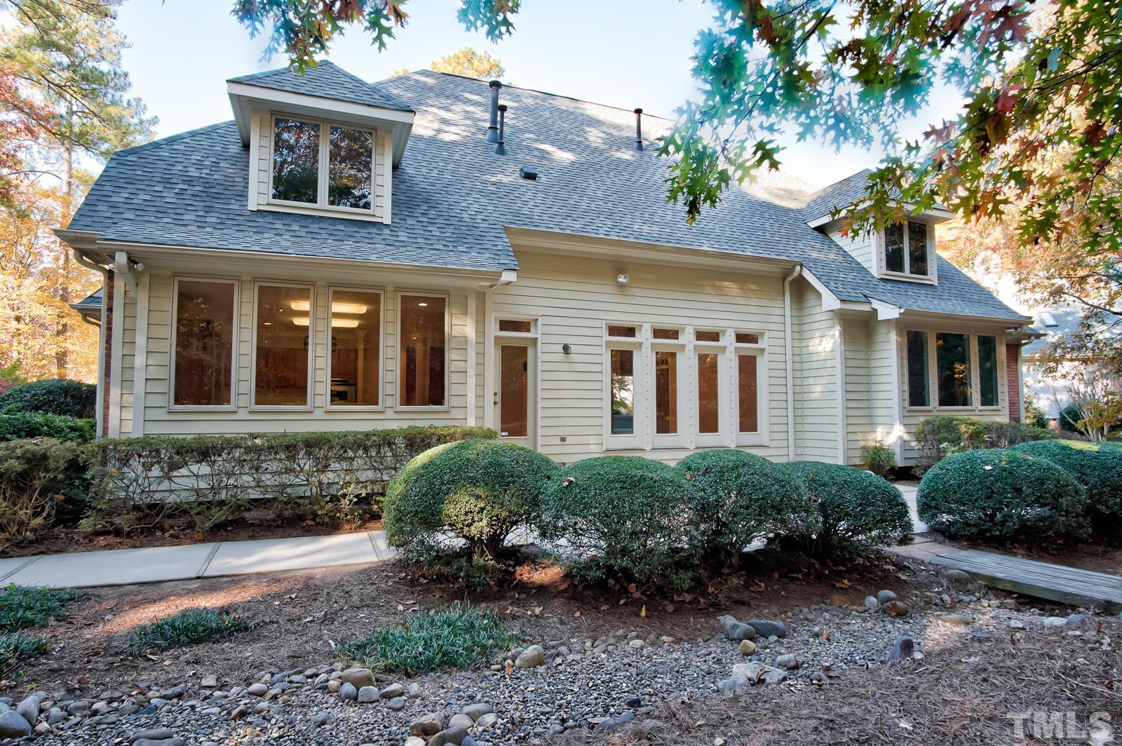 616 Bent Ridge Place Raleigh, NC 27615 - Photo 23 of 28 a front view of a house with garden