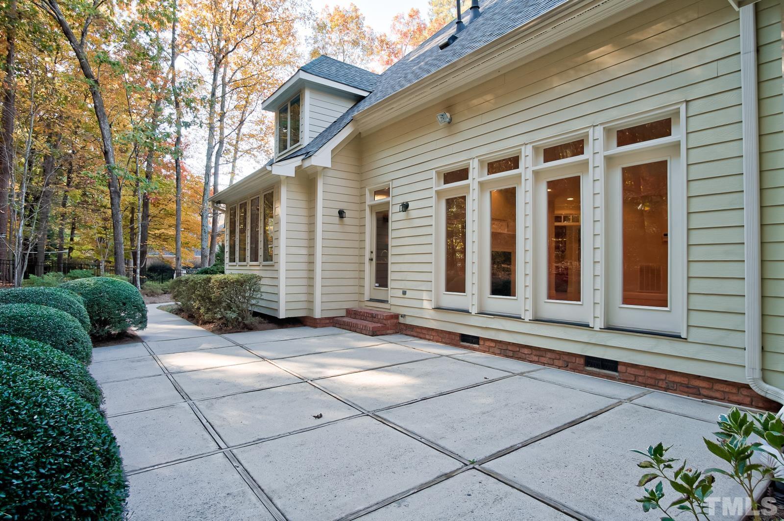 616 Bent Ridge Place Raleigh, NC 27615 - Photo 24 of 28 a view of a house with brick walls