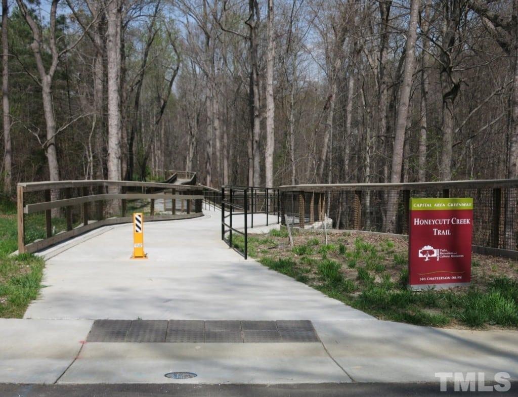 616 Bent Ridge Place Raleigh, NC 27615 - Photo 28 of 28 a view of outdoor space with garden and seating