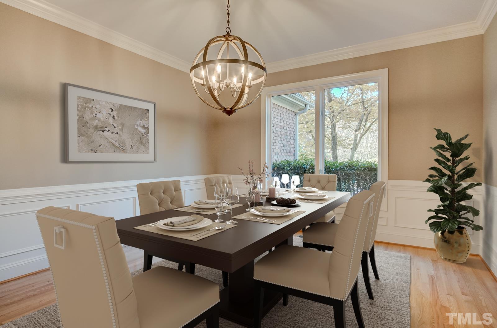 616 Bent Ridge Place Raleigh, NC 27615 - Photo 6 of 28 a view of a dining room with furniture window and wooden floor