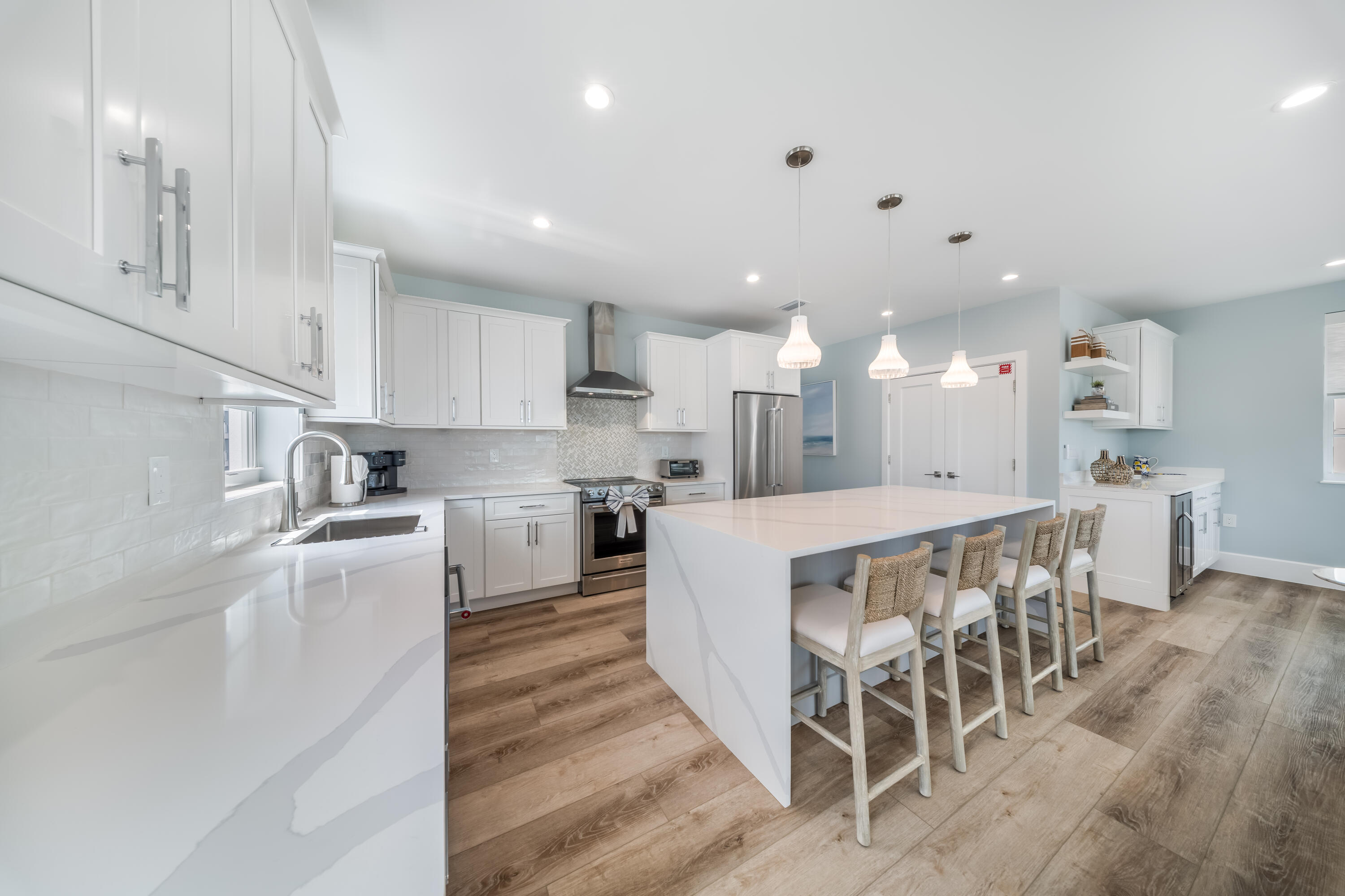 818 39th Street Marathon, FL 33050 - Photo 12 of 22 a kitchen with stainless steel appliances kitchen island granite countertop a table chairs sink and cabinets