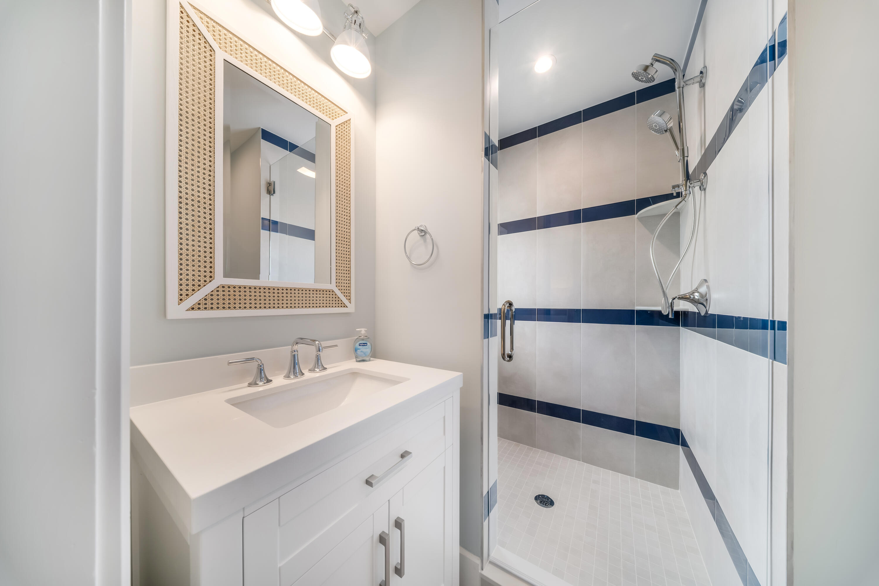 818 39th Street Marathon, FL 33050 - Photo 16 of 22 a bathroom with a sink a mirror and a shower